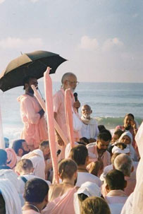 Srila Maharaja speaking on the beach at Jagannath Puri.