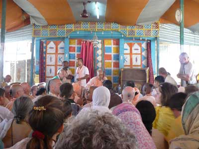 Srila Narayana Gosvami Maharaja discussing the organization of his society with his spiritual sons and daughters